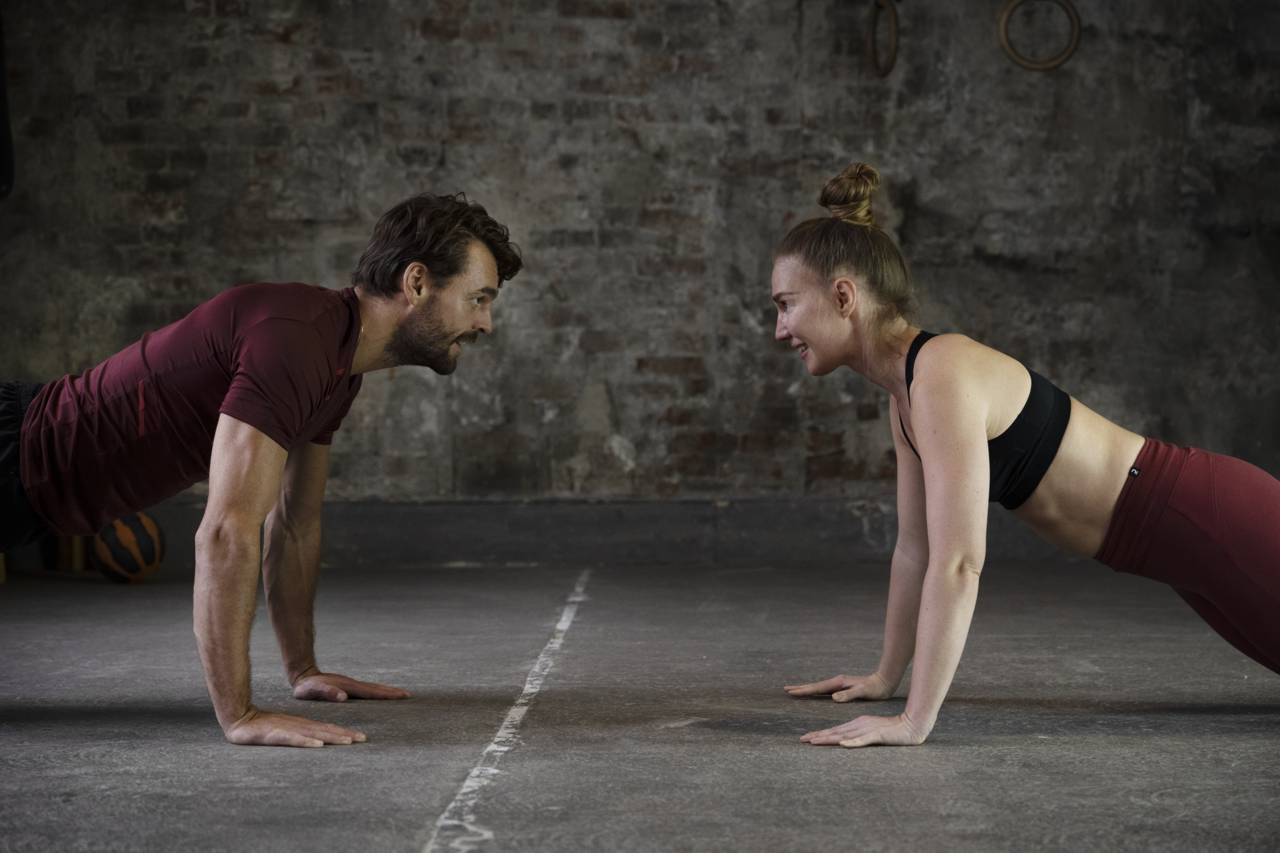 Medium Shot Fit People Doing Exercises